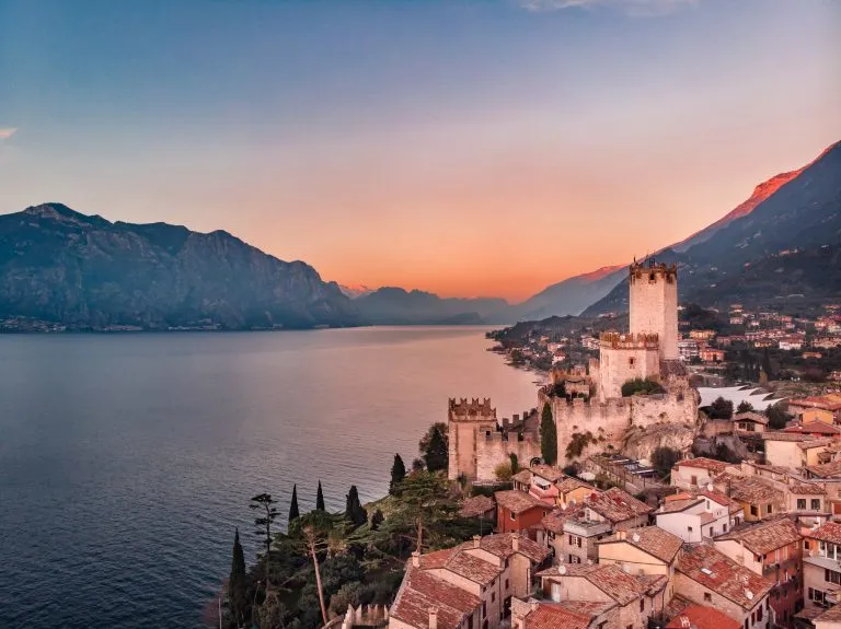 Lake Lago Garda - evening view of Malcesine village.
