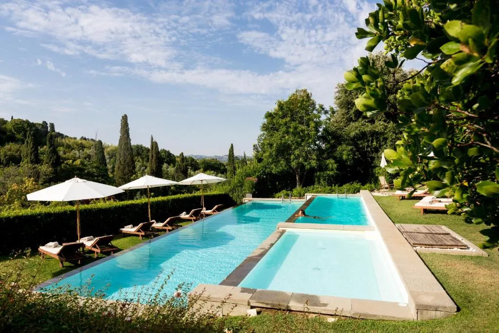 Pool area with sunbeds