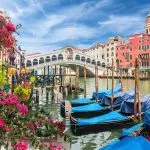 Glandscape with gondola on Grand Canal, Venice, Italy